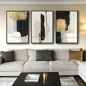 Set of three black, white and gold abstract framed prints for modern home decor.