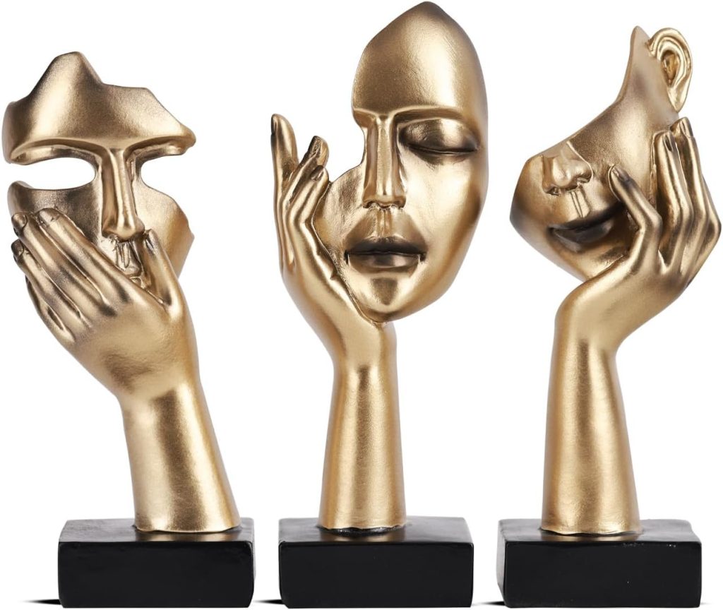 Black and gold Thinker statue trio with abstract poses for modern home decor.