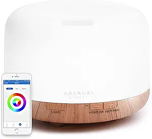 ASAKUKI smart Wi‑Fi essential oil diffuser in light brown with soft LED glow and 500ml tank.