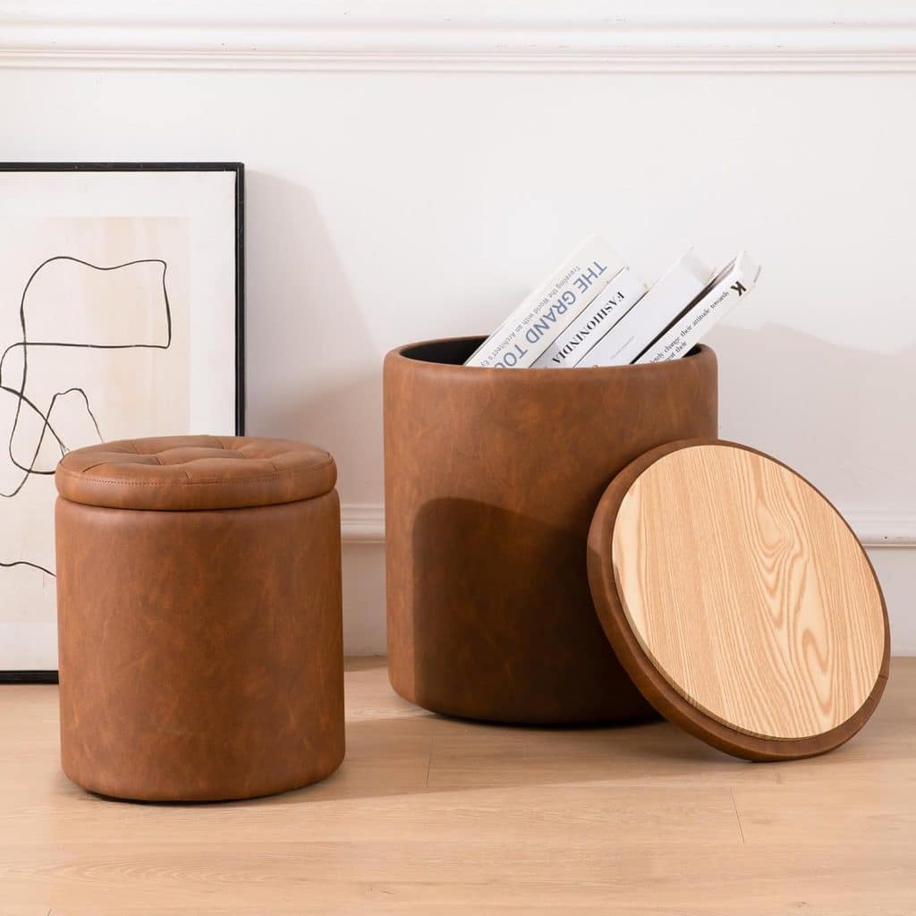 Brown faux‑leather round ottoman set with button‑tufted lids and hidden storage compartments.