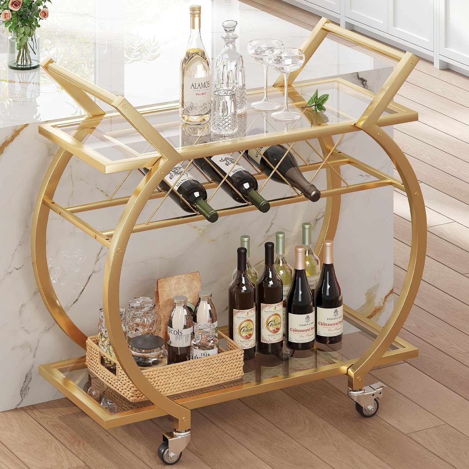 Gold bar cart with glass shelves, a stylish luxury home decor gift for entertaining.