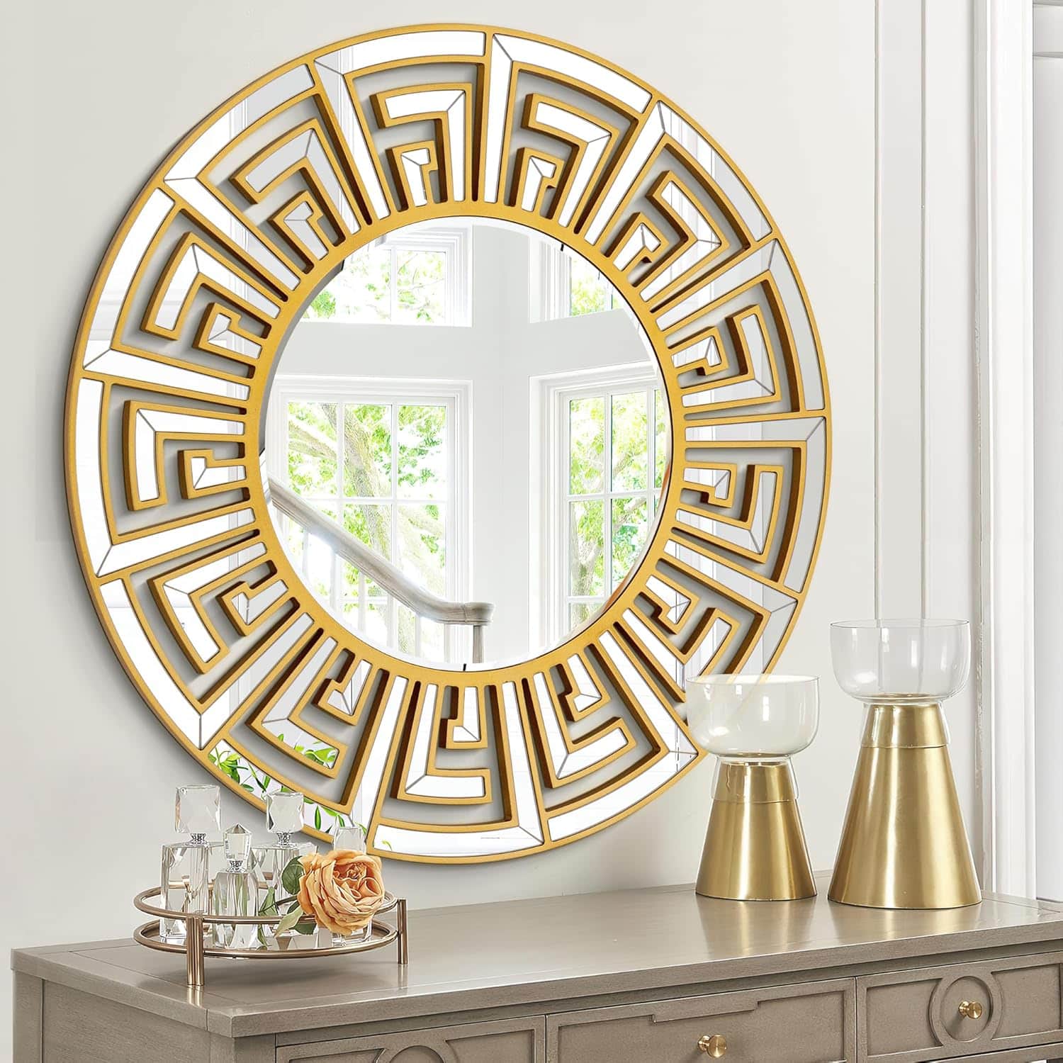 Large gold geometric mirror, a luxury home decor gift that adds a sculptural focal point.